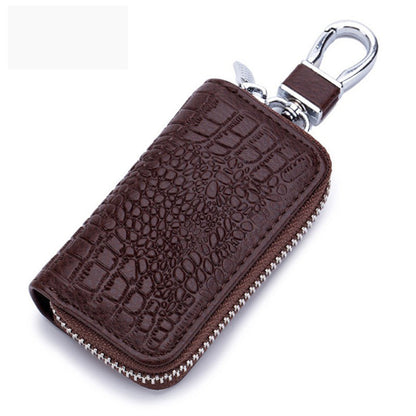 Porte-clés en cuir marron avec motif crocodile et fermeture éclair métallique