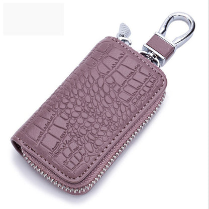 Porte-clés en cuir violet à texture crocodile avec fermeture éclair et mousqueton argenté